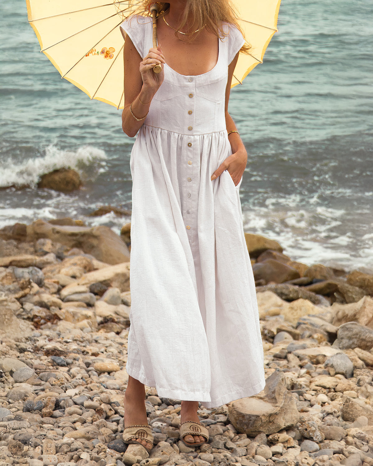 White midi dress with short sleeves for a casual boho wedding. 