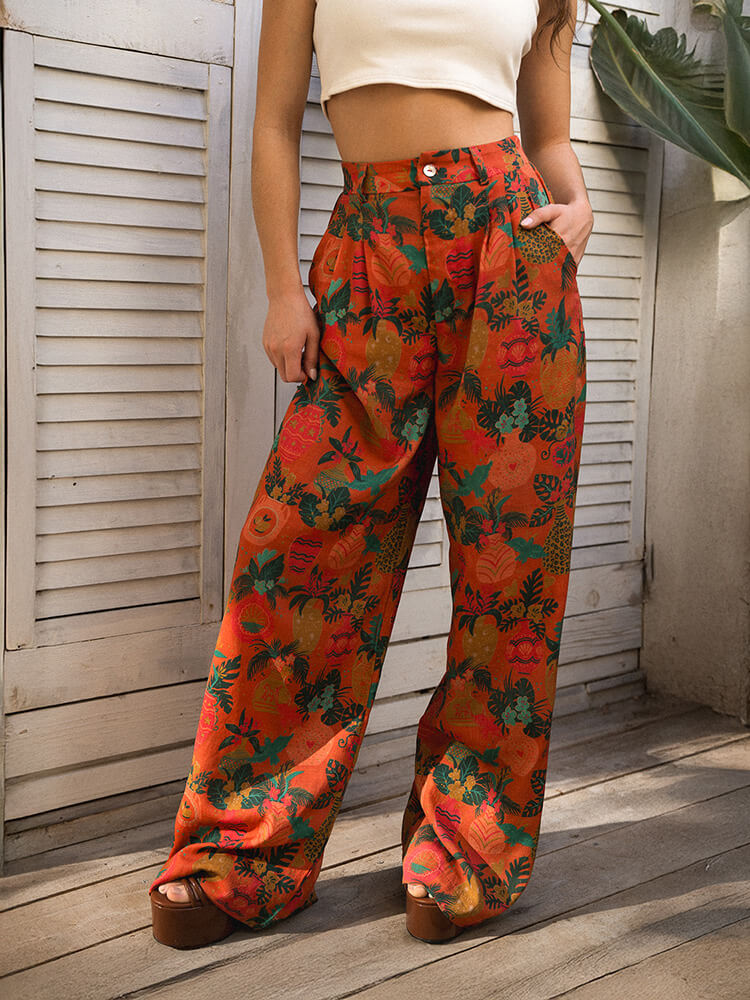 Fun, colorful printed linen pants with a tropical pattern. They feature pockets, an elastic waist band, belt loops, and mother of pearl shell buttons. 
